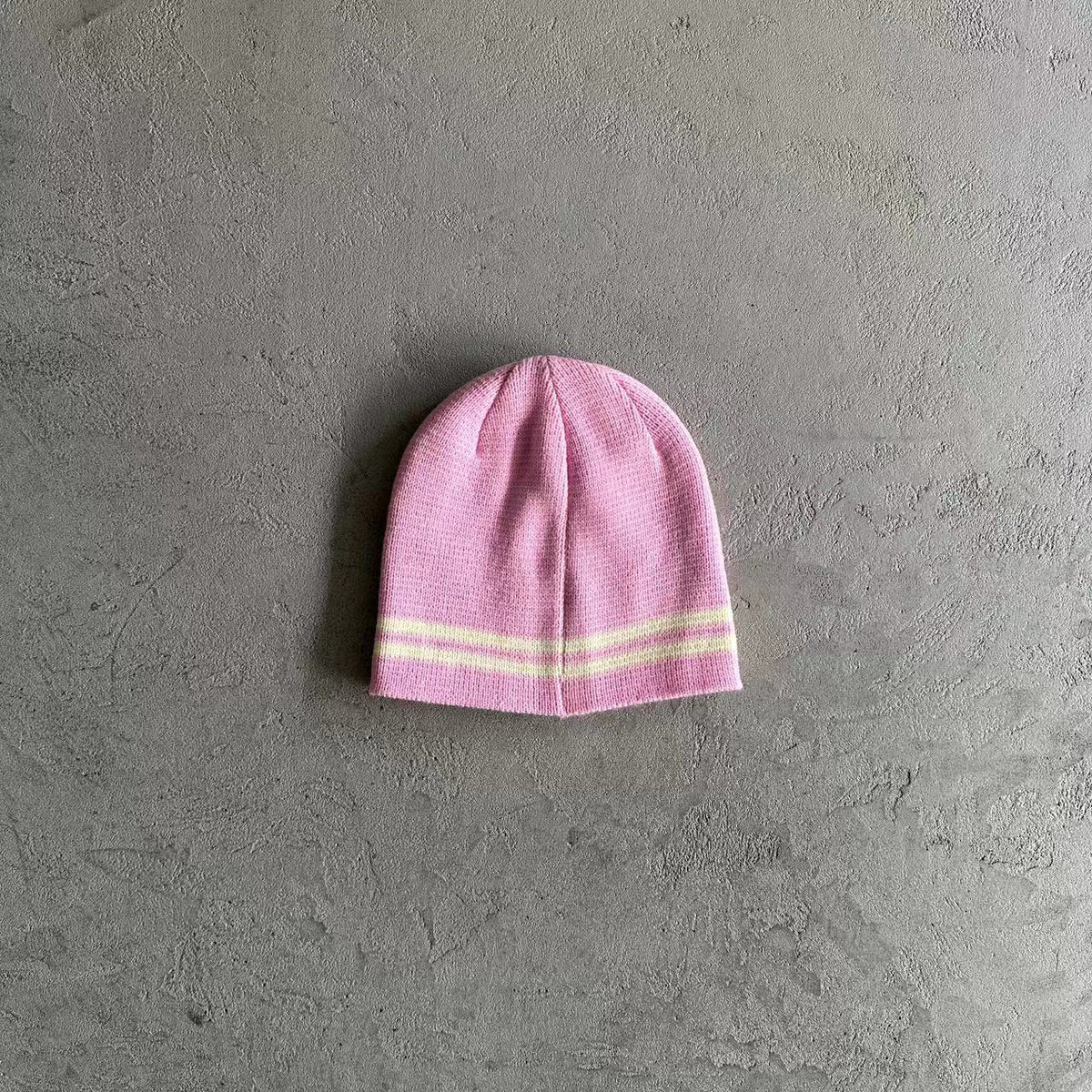 Bonnet à rayures en tricot Corteiz - Rose