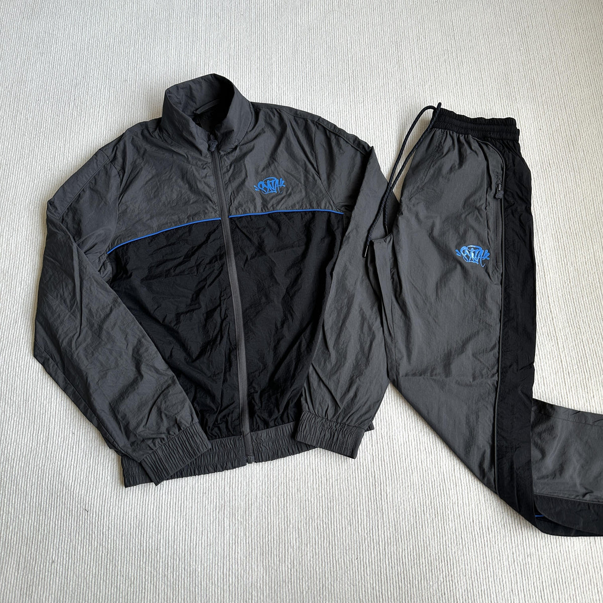 Équipe de survêtements Synaworld