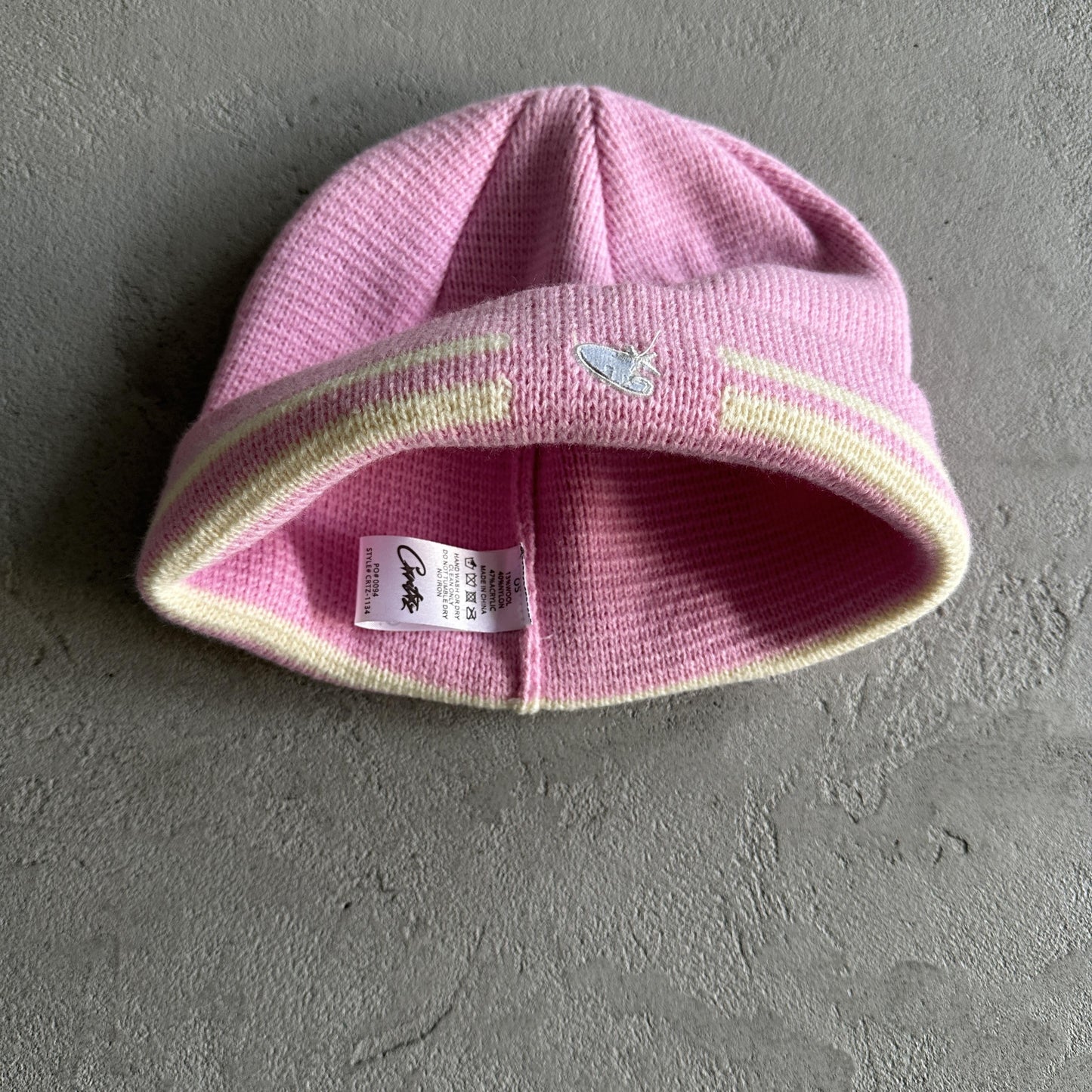 Bonnet à rayures en tricot Corteiz - Rose