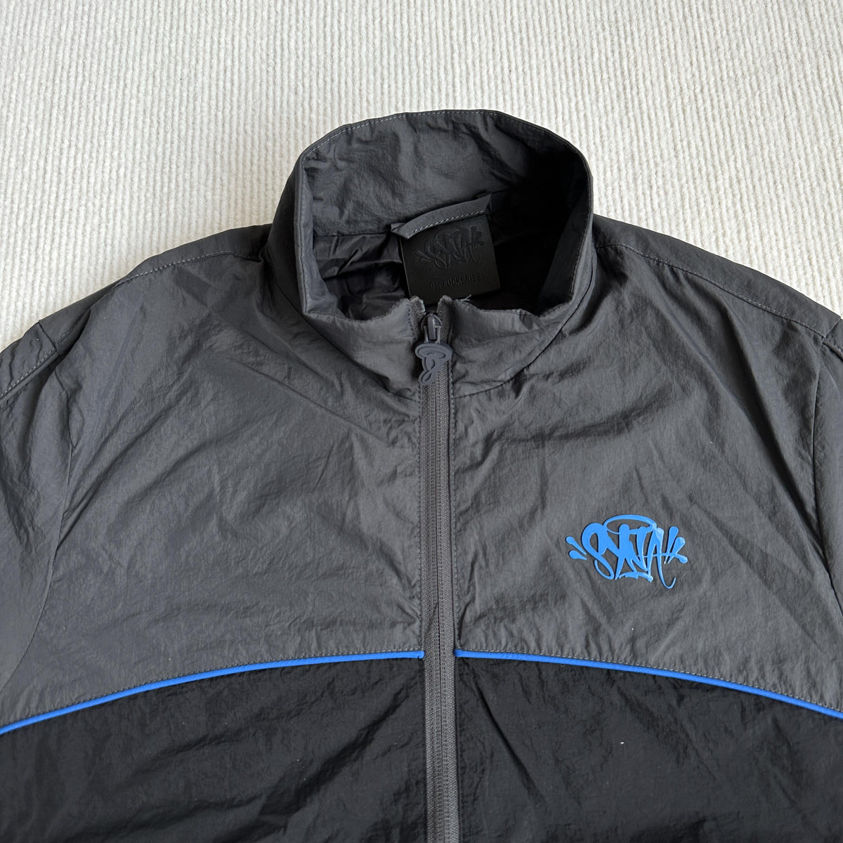 Équipe de survêtements Synaworld