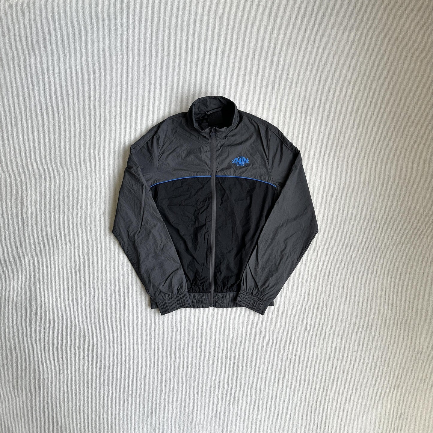 Équipe de survêtements Synaworld