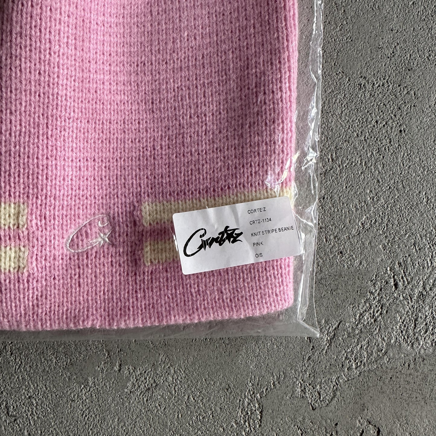 Bonnet à rayures en tricot Corteiz - Rose
