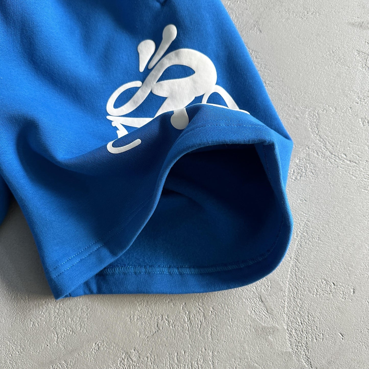 Ensemble court à capuche Synaworld