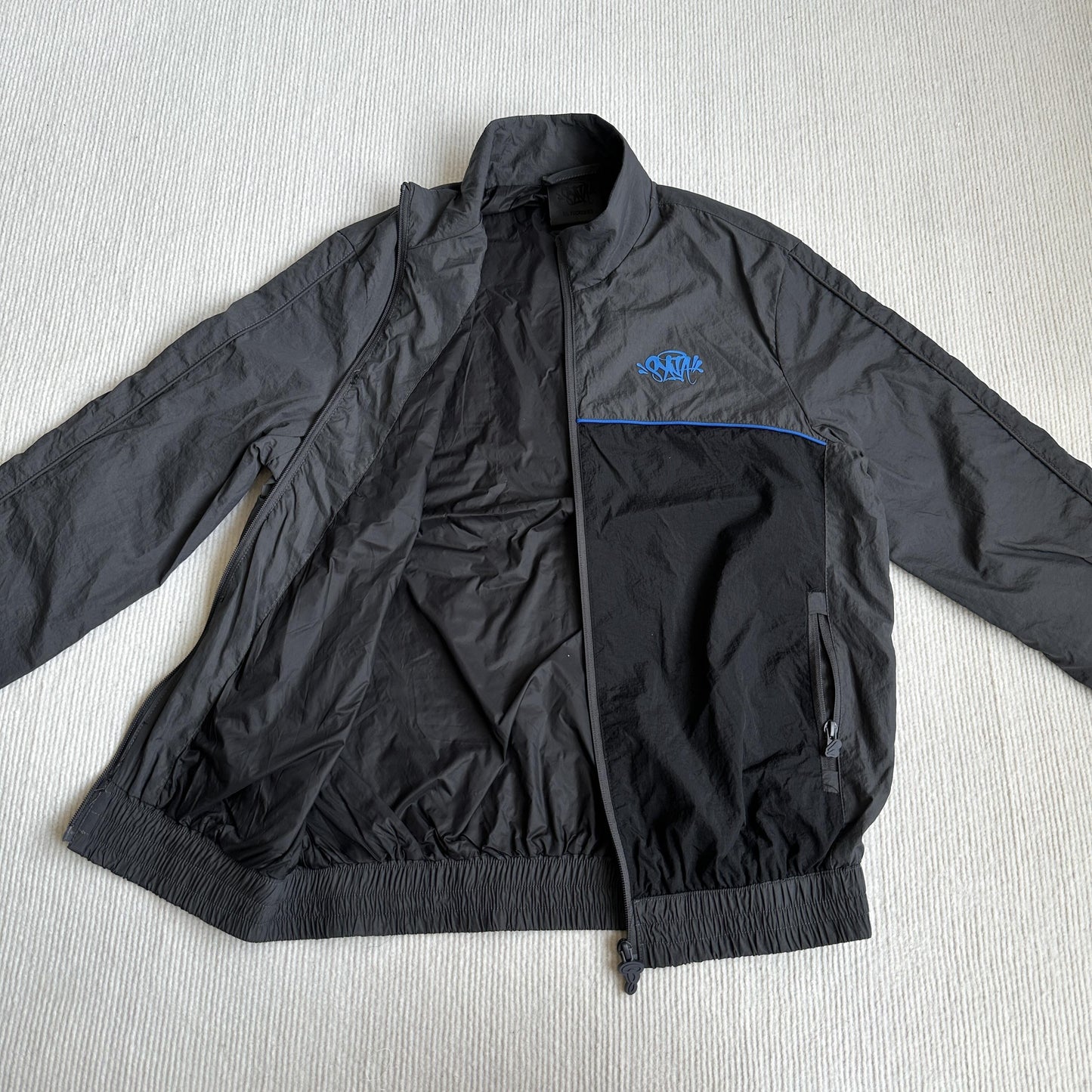 Équipe de survêtements Synaworld