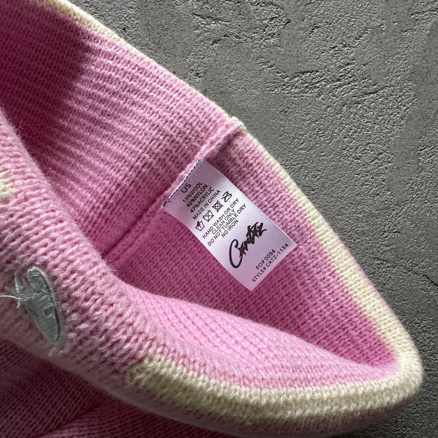 Bonnet à rayures en tricot Corteiz - Rose